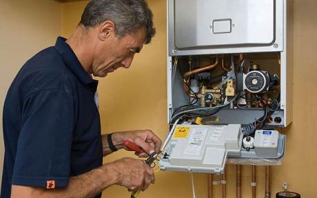 Boiler-repair-man-at-work1 (1)
